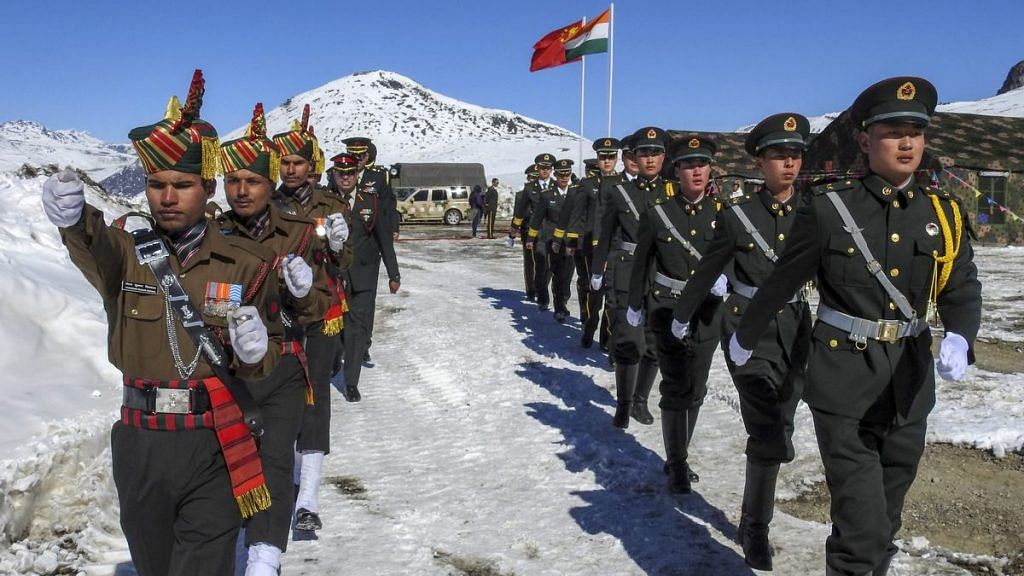 Indian and Chinese soldiers jointly celebrate the New Year 2019 at Bumla along the Indo-China border, Arunachal Pradesh