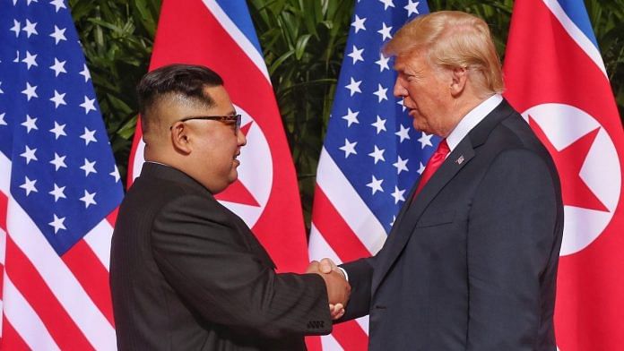 File image of Kim Jong Un with Donald Trump
