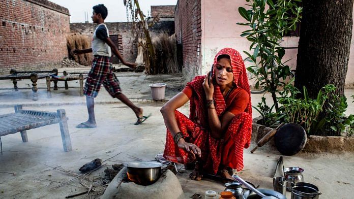 A woman speaks on the telephone in Auwar Village in Pratapgarh district of Uttar Pradesh (Representational image)