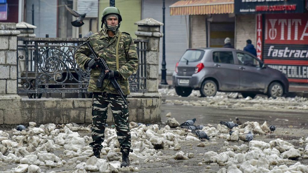 A security personnel stands guard at Lal Chowk | PTI