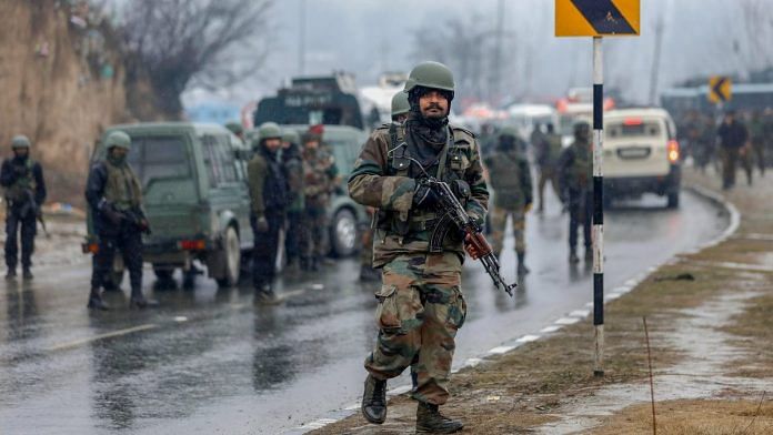 Awantipora: Army soldiers near the site of suicide bomb attack at Lathepora Awantipora in Pulwama district of south Kashmir, Thursday, February 14, 2019. At least 30 CRPF jawans were killed and dozens other injured when a CRPF convoy was attacked