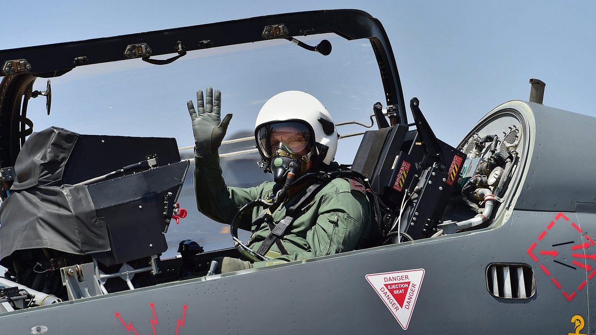 Army chief Gen Bipin Rawat waves from the cockpit of the the aircraft | Shailendra Bhojak/PTI