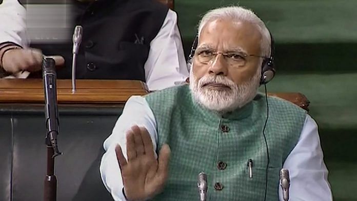 PM Narendra Modi cheers as Piyush Goyal presents the interim Budget 2019-20 in Lok Sabha | PTI