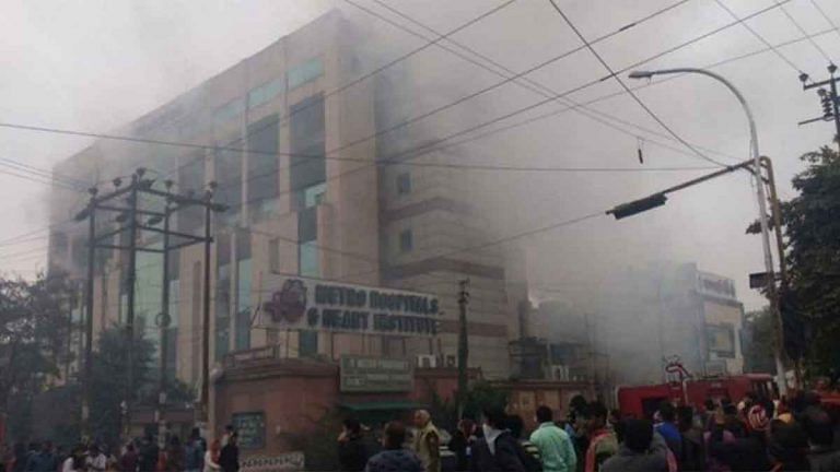 In images, people trapped in Noida hospital fire stranded on ledges & balconies
