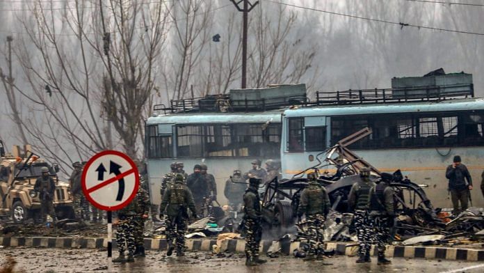 Security personnel at the site of suicide bomb attack, Pulwama | PTI