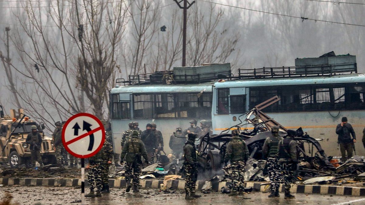 Security personnel at the site of suicide bomb attack, Pulwama | PTI
