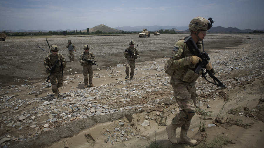 Soldiers from 2nd Platoon Fox Co. of the 2-506th Infantry Battalion of the 4th Brigade of the 101st Airborne Division conduct a counter indirect fire patrol from their base at COP Sabari in the Sabari district of Khost province, Afghanistan