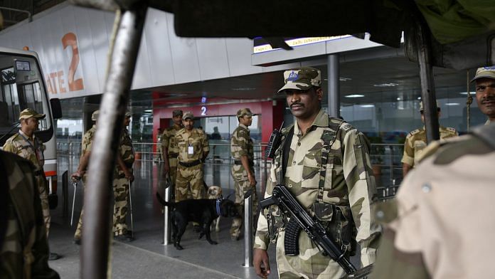 Armed security guards at the Indira Gandhi International Airport | Anindito Mukherjee/Bloomberg