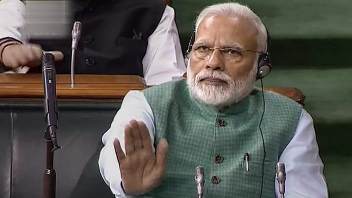 PM Narendra Modi cheers as Finance Minister Piyush Goyal presents the interim Budget 2019-20 | PTI