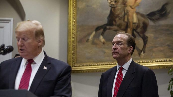 David Malpass, World Bank president nominee for U.S. President Donald Trump, right, listens while Trump speaks in the Roosevelt Room of the White House in Washington, D.C., on 6 Feb., 2019