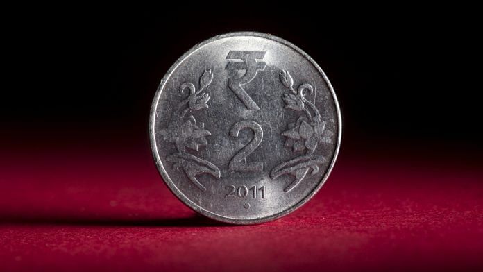 An Indian coin | Brent Lewin/Bloomberg
