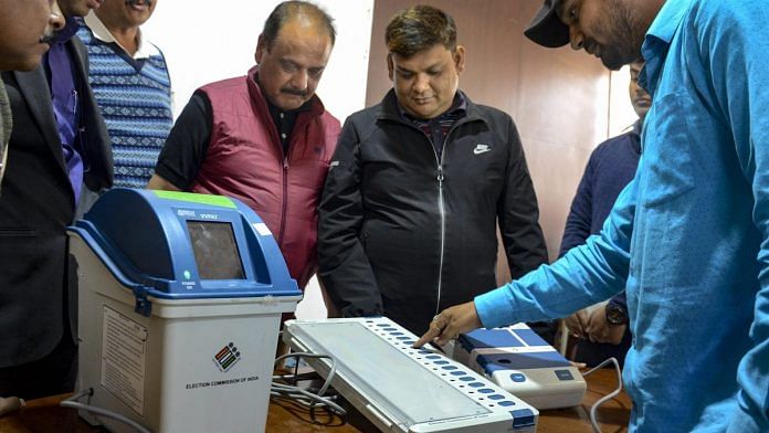 An election official demonstrates the working of a Voter-Verified Paper Audit Trail | PTI