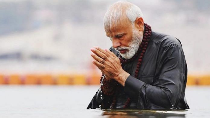 File photo of PM Modi taking a dip at the Sangam in Prayagraj during the Kumbh Mela | narendramodi/Instagram