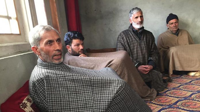 L-R: Ghulam Hassan Dar, father of Adil Dar, the Hizbul Mujahideen militant, with his relatives at his house in Gundibagh, Pulwama | Moushumi Das Gupta/ThePrint