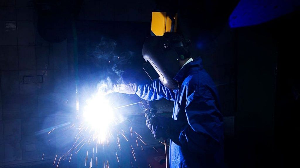 A student attends a welding class during vocational training at the Infrastructure Leasing & Financial Services (IL&FS) Institute of Skills in New Delhi, India