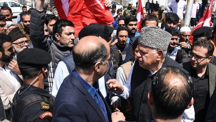 Jammu & Kashmir National Conference president Farooq Abdullah with party leaders during a protest against the closure of Jammu-Srinagar-Baramulla national highway for civilian vehicles, in Srinaga | S. Irfan | PTI