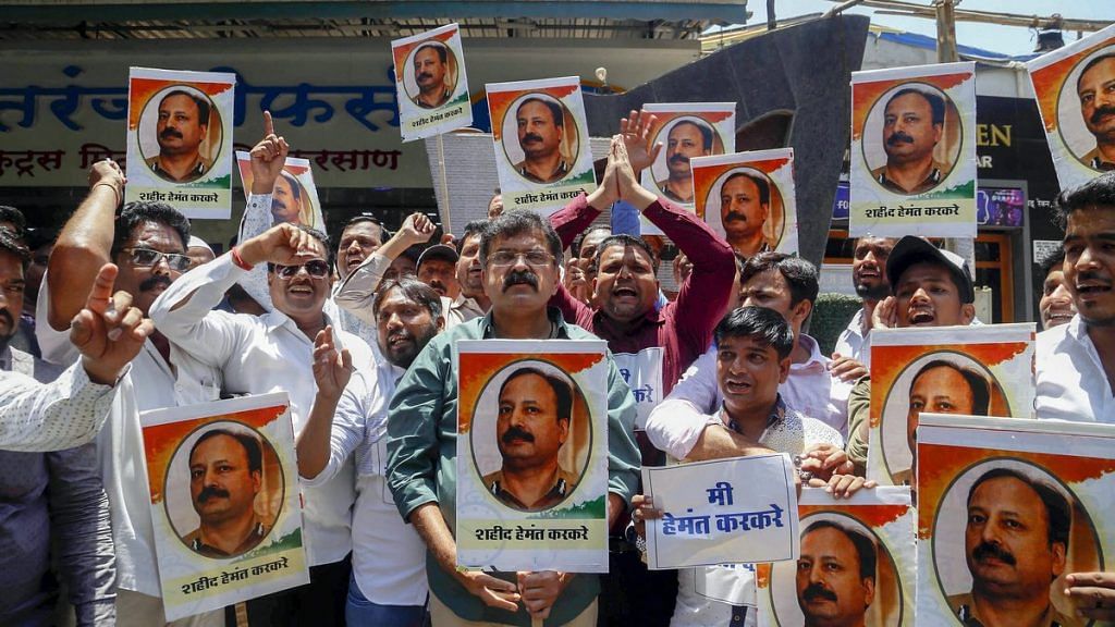 NCP workers protest Pragya Singh Thakur's comment against Hemant Karkare, in Thane | PTI