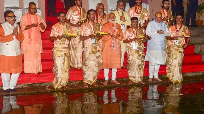 Prime Minister Narendra Modi performs 'Ganga Arti' at Dashashwamedh Ghat after his mega roadshow in Varanasi | PTI Photo | Manvender Vashis