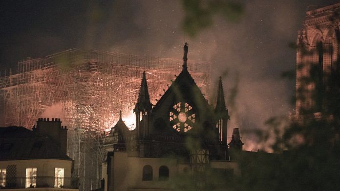 Flames and smoke rise from a fire at Notre-Dame Cathedral in Paris