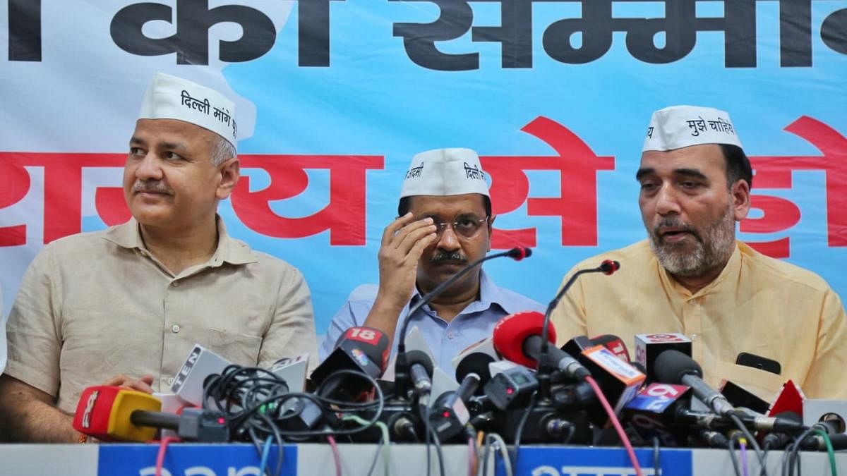 Manish Sisodia, Arvind Kejriwal and Gopal Rai at the launch of AAP manifesto