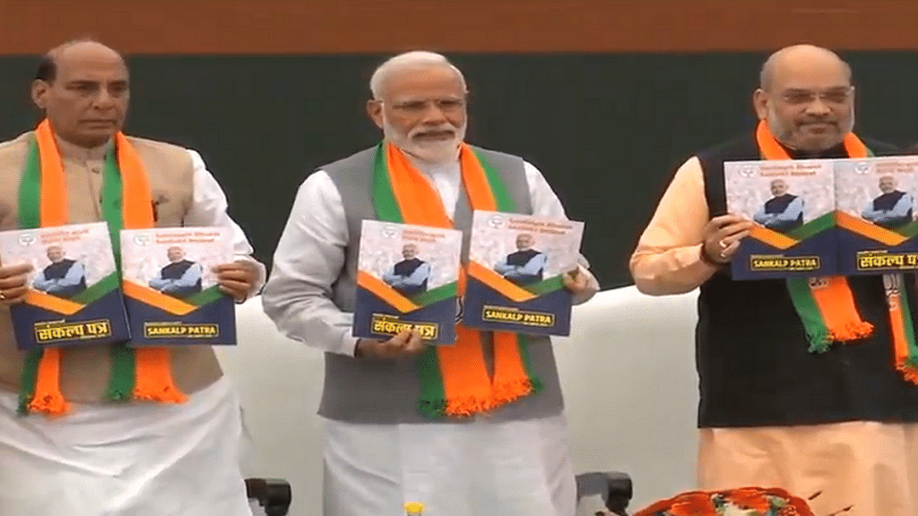Rajnath Singh, PM Modi and Amit Shah launching the BJP manifesto
