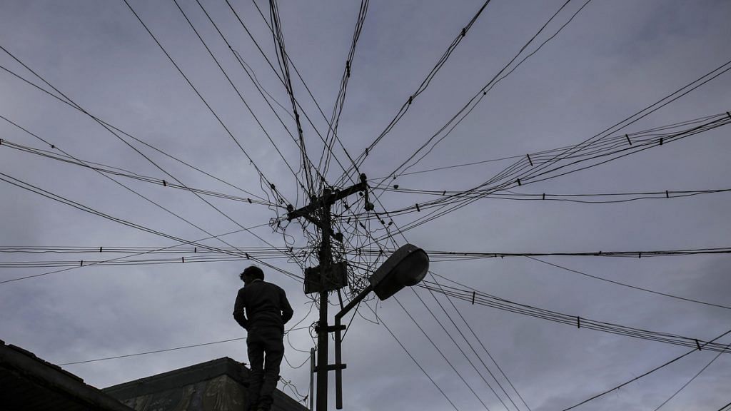 A utility pole in Coonoor, Tamil Nadu | Dhiraj Singh/Bloomberg