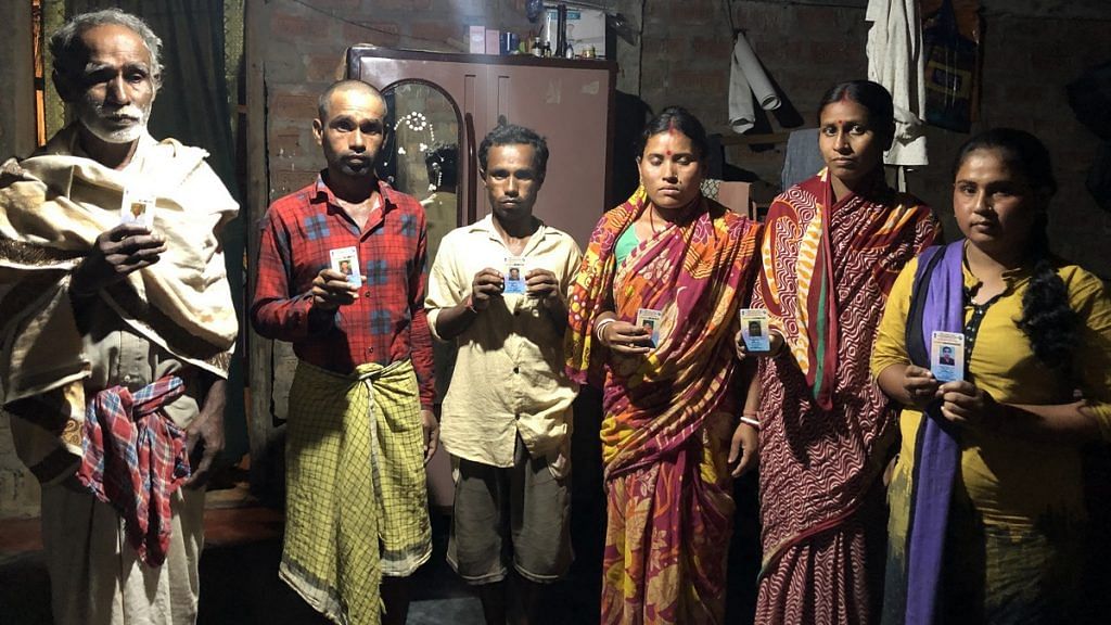 Sulekhar Das and her family display their ID cards | Ruhi Tewari/ThePrint