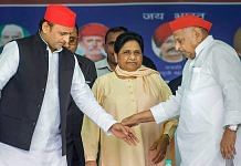 Mainpuri: Samajwadi Party patron Mulayam Singh Yadav, his son and party President Akhilesh Yadav and Bahujan Samaj Party supremo Mayawati during their joint election campaign rally in Mainpuri, Friday,