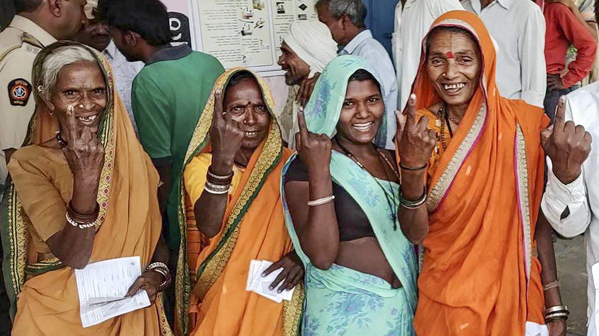 Women cast their votes at a polling station in Nashik, | PTI