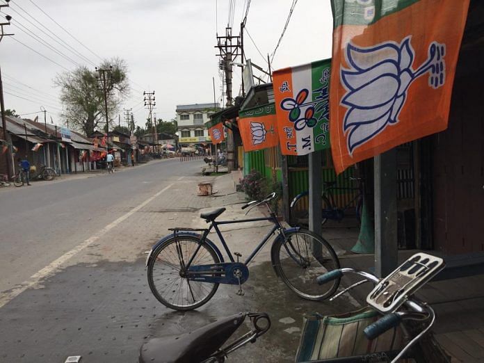 Trinamool Congress and Bharatiya Janata Party flags on display in Cooch Behar | Moushumi Das Gupta/ThePrint