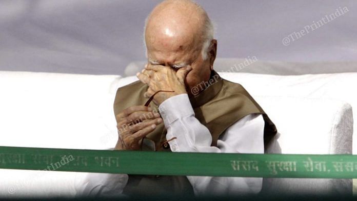 Former deputy prime minister L.K. Advani wipes his eyes at the Ambedkar Jayanti ceremony | Photo: Praveen Jain | ThePrint