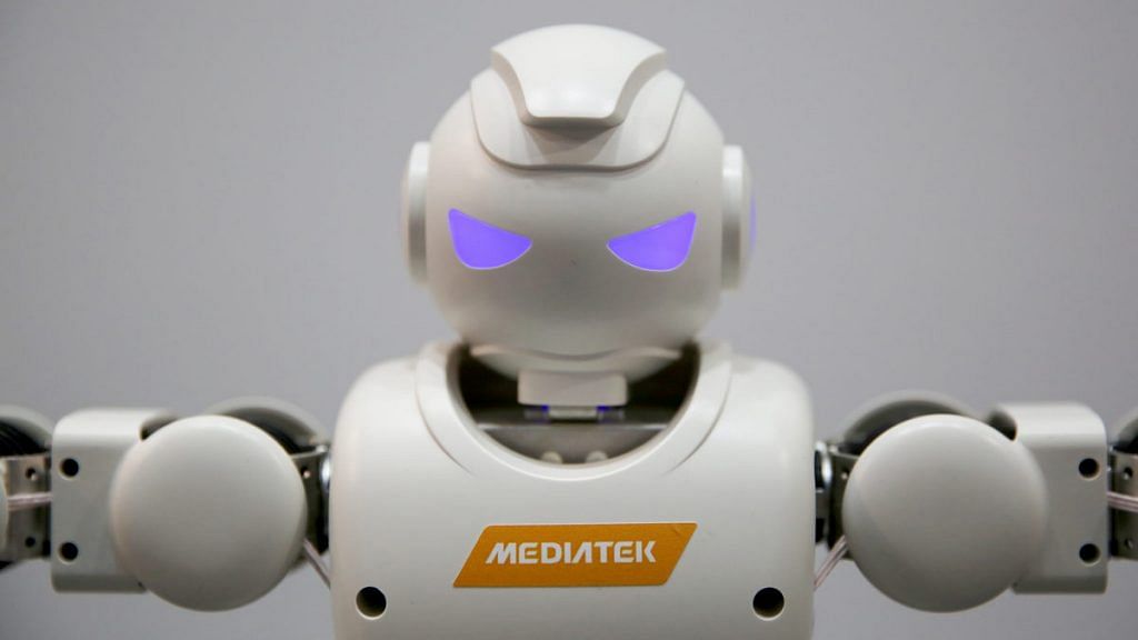 A robot stands on display on the MediaTek Inc. stand