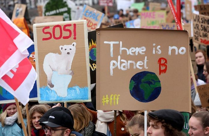 High school students demonstrate against global warming. | Adam Berry / Getty Images