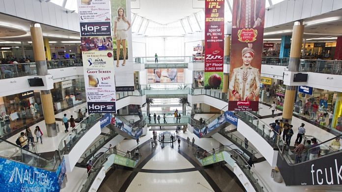 Shoppers walk through South City Mall in Kolkata | Brent Lewin/Bloomberg
