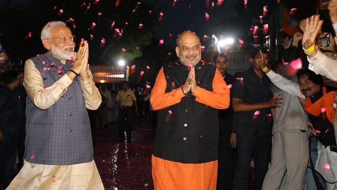 PM Modi with BJP president Amit Shah at the party headquarters, New Delhi