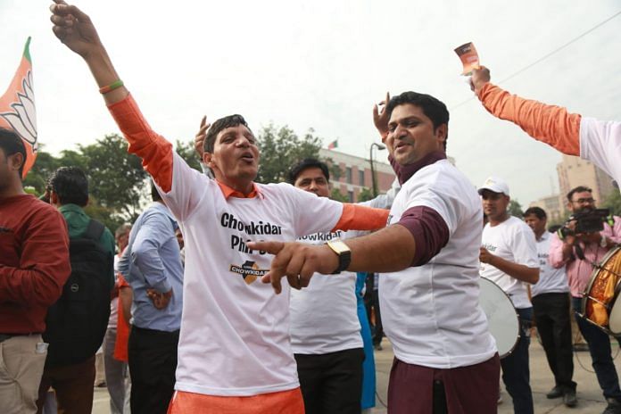 BJP workers celebrate at the party's headquarters in New Delhi | Manisha Mondal | ThePrint