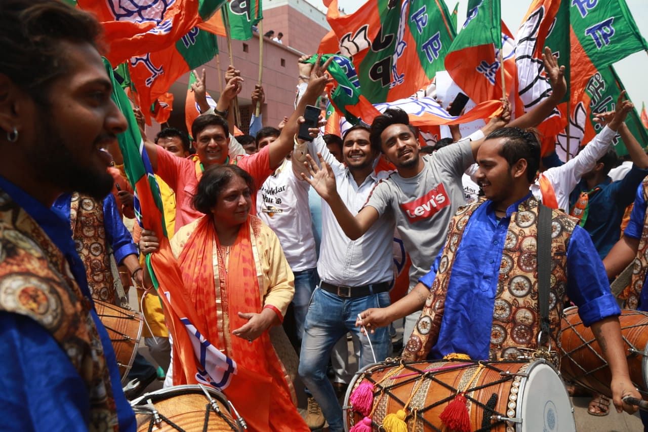 BJP workers celebrating at the BJP headquarters in New Delhi | ThePrint photo by Manisha Mondal