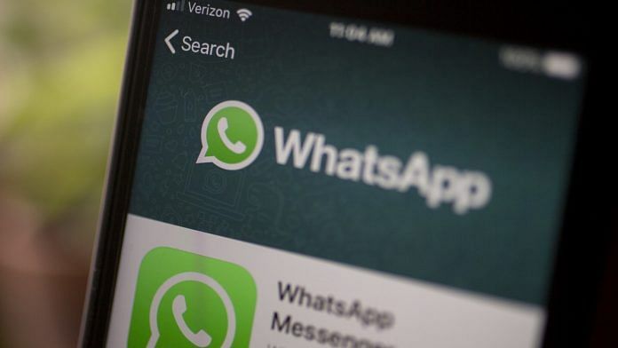 WhatsApp app logo displayed on a phone