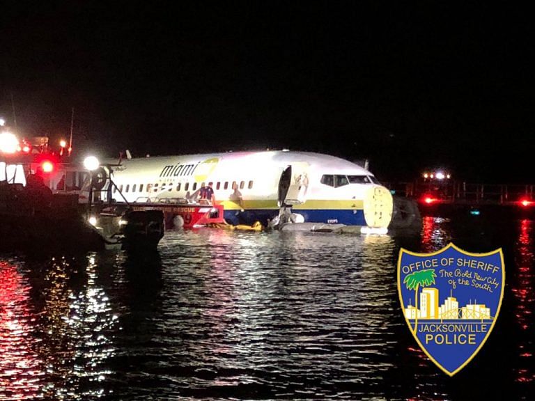 Boeing 737-800 slides off runway into US river after landing