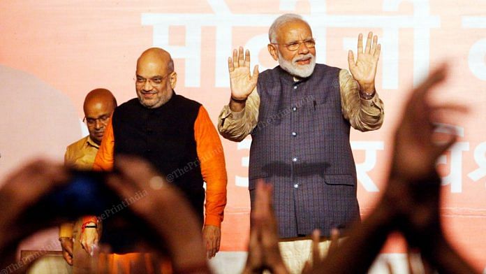 Prime Minister Narendra Modi with BJP president Amit Shah at the party headquarters in New Delhi on 23 May | Praveen Jain | ThePrint Photo