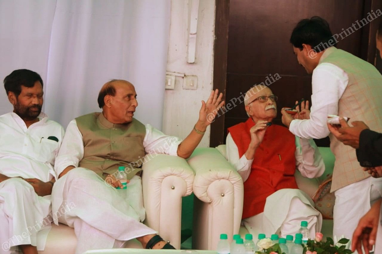 The host offers Phirni to L.K. Advani | Photo: Manisha Mondal | ThePrint