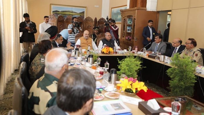 Home minister Amit Shah chairs a meeting in Srinagar to review the security arrangements for the Amarnath Yatra. | Twitter | @HMOIndia