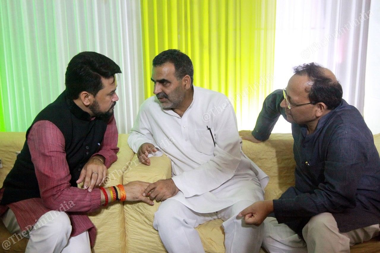 Union ministers Anurag Thakur and Sanjeev Balyan with BJP's national general secretary Arun Singh (extreme left) | Photo: Praveen Jain | ThePrint