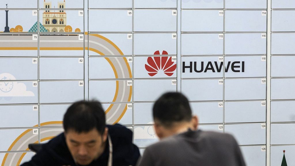 The Huawei Technologies Co. logo | Bloomberg