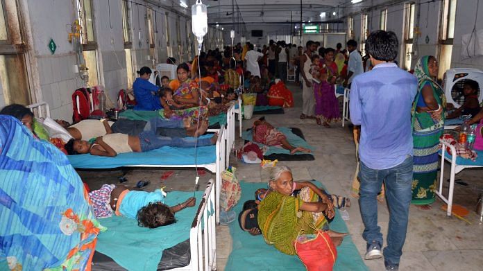 Family members take care of children admitted to a special ward due to the symptoms of Acute Encephalitis Syndrome (AES) in Muzaffarpur . | ANI Photos