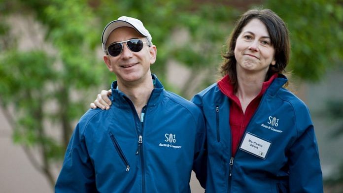 Jeff Bezos, founder and chief executive officer of Amazon.com Inc., and his wife MacKenzie Bezos, arrive for morning sessions at the 28th annual Allen & Co. Media and Technology Conference in Sun Valley, Idaho, U.S