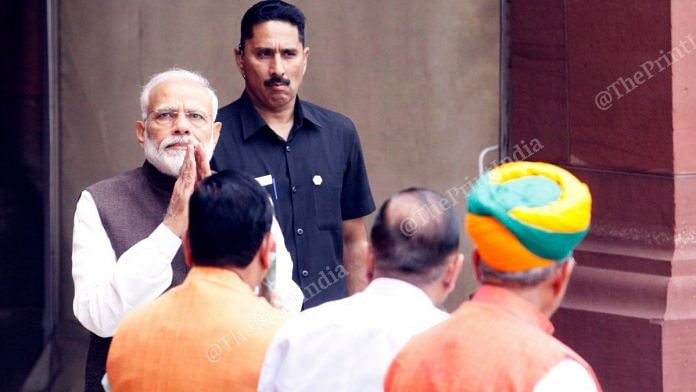 Prime Minister Narendra Modi greets leaders before entering the Parliament | Photo: Praveen Jain | ThePrint