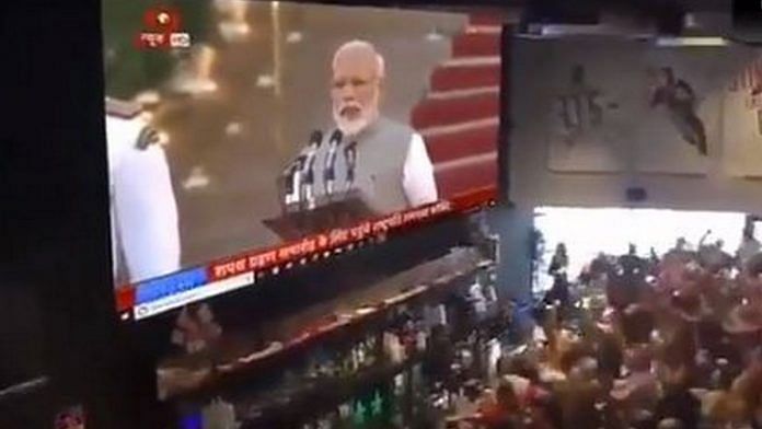 Screenshot of crowd cheering for Narendra Modi