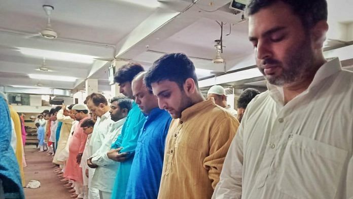 People from the Shia and Sunni Muslim community jointly hold namaaz at Masjid Babul Ilm. People with hands folded are Sunnis and those with their hands down are from the Shia community | By special arrangement