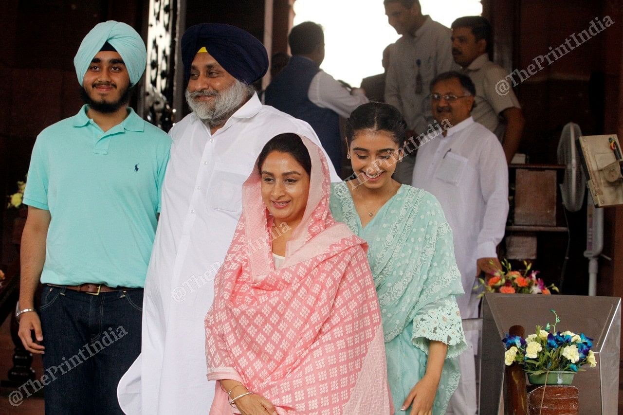 MPs Sukhbir Singh Badal and Harsimrat Kaur Badal with their son and daughter coming out of Parliament
